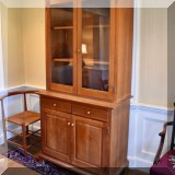 F31. Asher Benjamin & Co. glass front cherry hutch. 80”h x 39” w x 20”d 